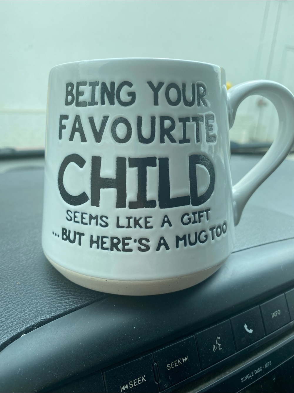 White Ceramic Mug with 'Being Your Favourite Child' Text